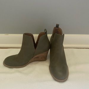 Report Olive green wedge booties